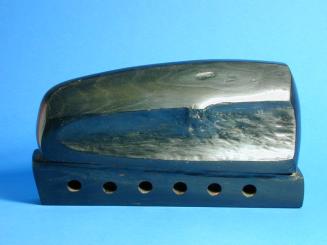 Untitled (Black Wood Shape with Six Holes along Mid Line