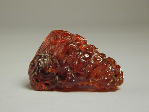 Pebble Form Carving of a Mountain and a Dragon