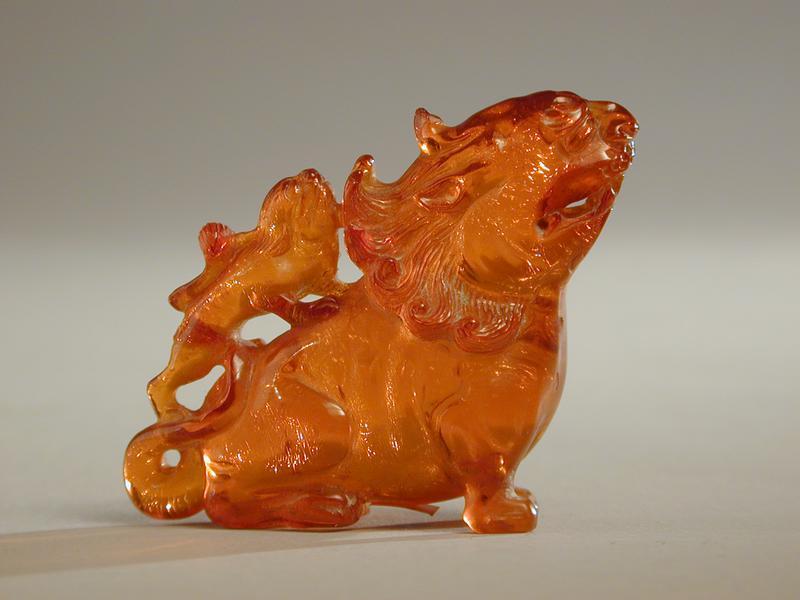 Amber Figurine of a Buddhistic Lion and Pup