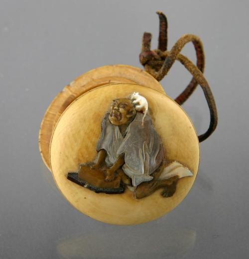 Netsuke with Inlaid Design of a Rat Catcher