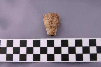 Toy Whistle in the Shape of a Man's Head