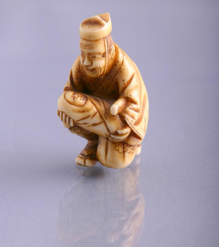 Netsuke: Ivory Figure of Taketori no Okina and Moon Child Baby