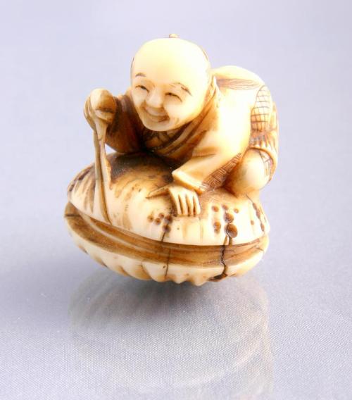 Netsuke:  Figure on a Giant Clam