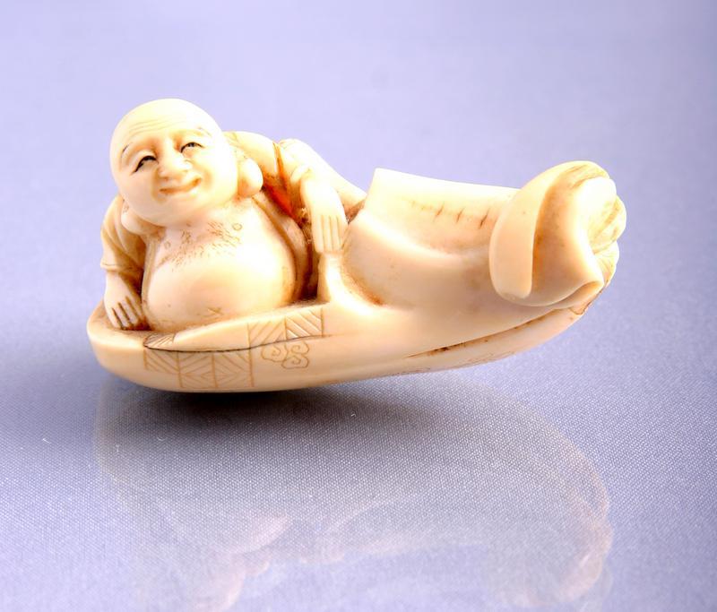 Ivory Netsuke: Hotei in a Boat