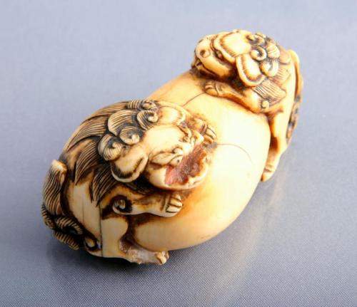 Netsuke: Two Lion Dogs (shishis) on a Sphere