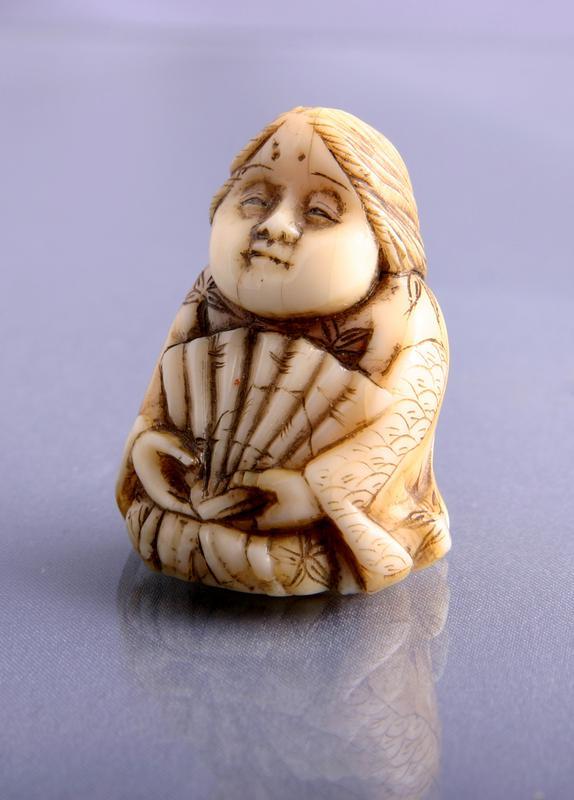 Netsuke: Ivory Figure of Okame with a Fan