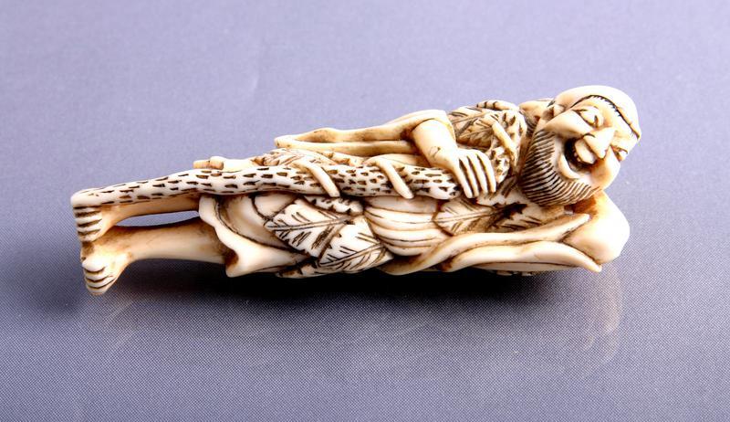 Ivory Netsuke: Sennin with a Peach and a Staff