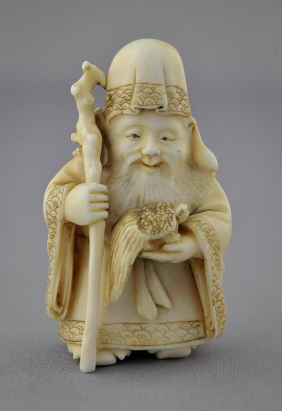 Netsuke of Man and Bird