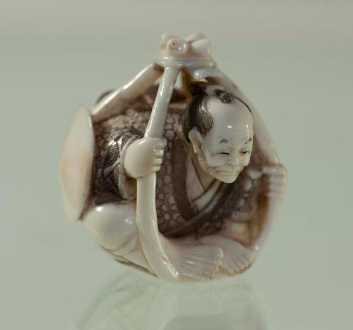 Netsuke of a Man in a Transport Bucket