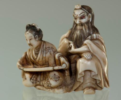 Netsuke of Shoki with an Attendant