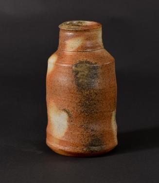 Wood fired tall brown vase