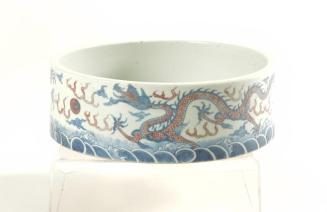 Washer with underglaze blue and red design of three dragons chasing flaming pearls