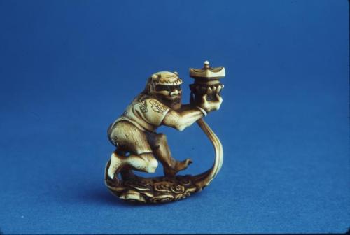 Netsuke depicting an Oni Lantern  Bearer