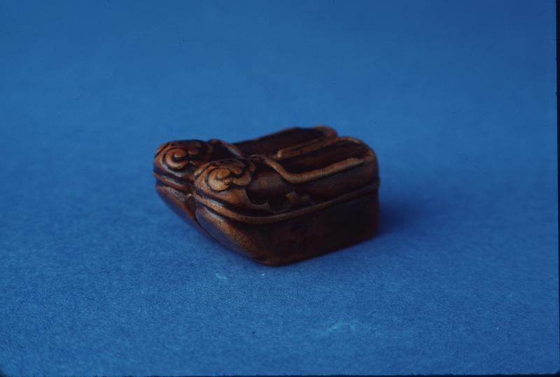 Netsuke depicting Monk's Shoes