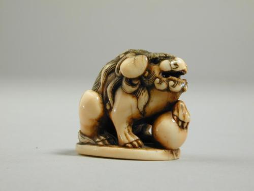 Netsuke of a Lion Dog (shishi) with a Ball