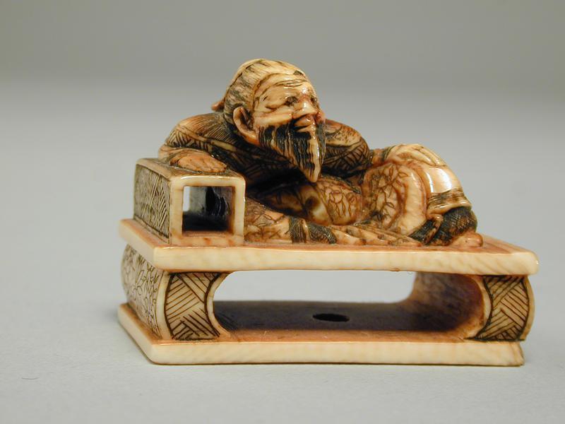 Reclining Scholar Netsuke