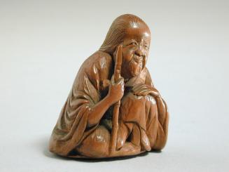 Netsuke: Seated Man with Staff