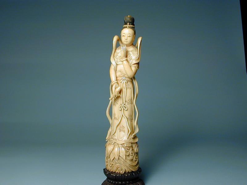 Guanyin holding a bottle (kalasa)